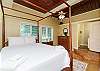 Master bedroom with queen size bed and private bathroom