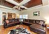 Living area with a large cozy sectional to relax on throughout the day 