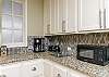 Kitchen area with 12-cup coffee maker 