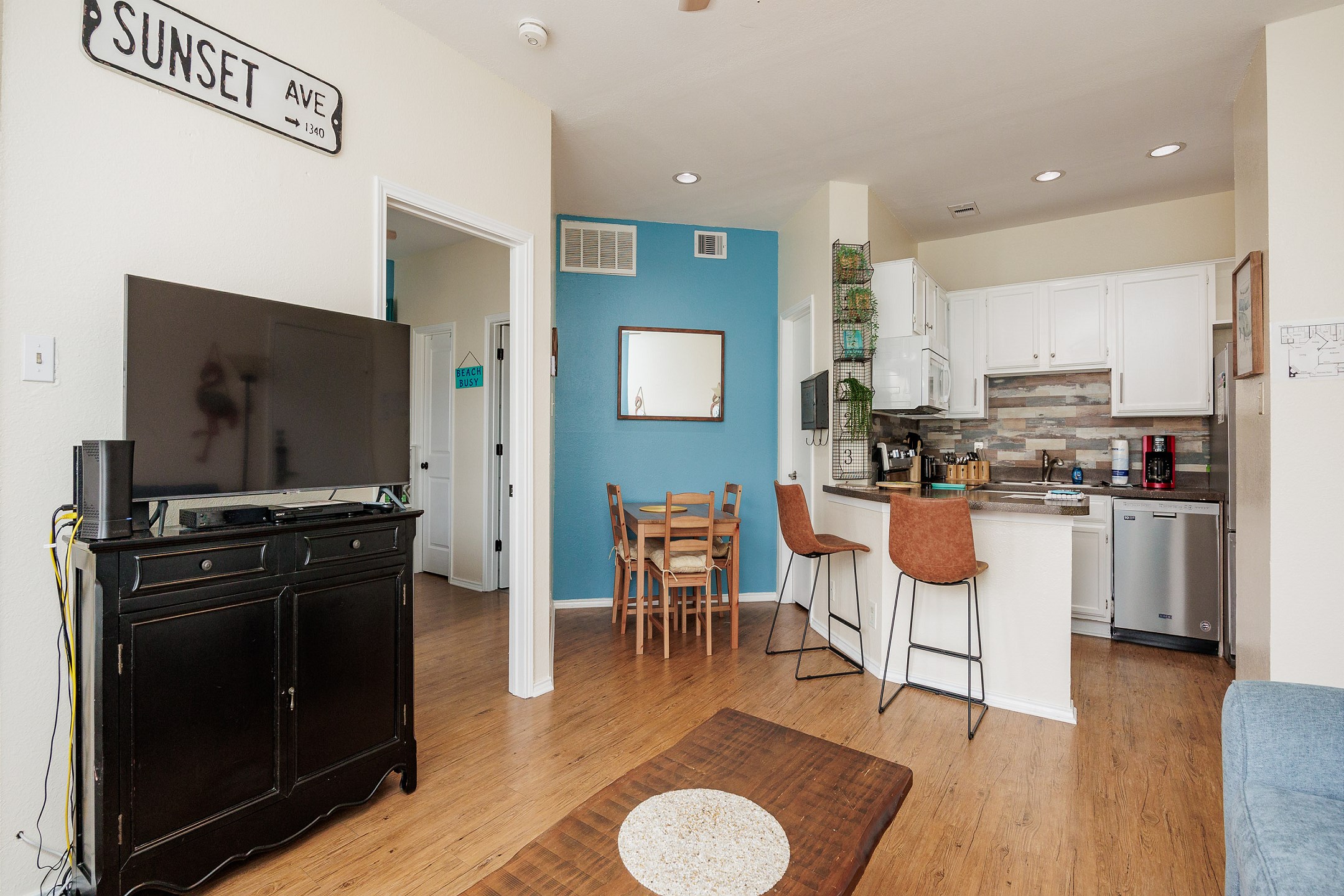 Open concept living area open to the dining room and kitchen