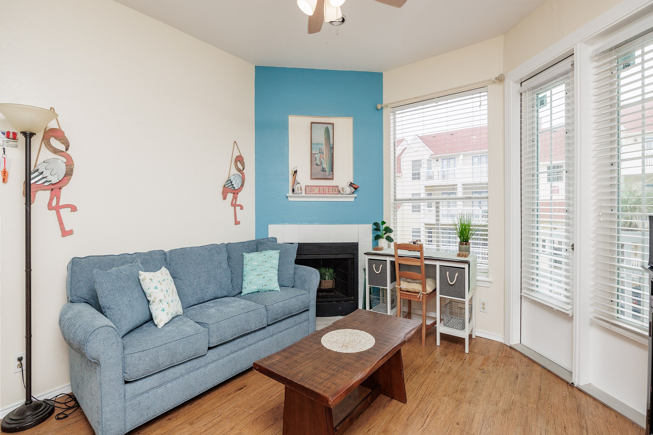 Newly updated living area with coastal décor throughout and a new queen sleeper sofa