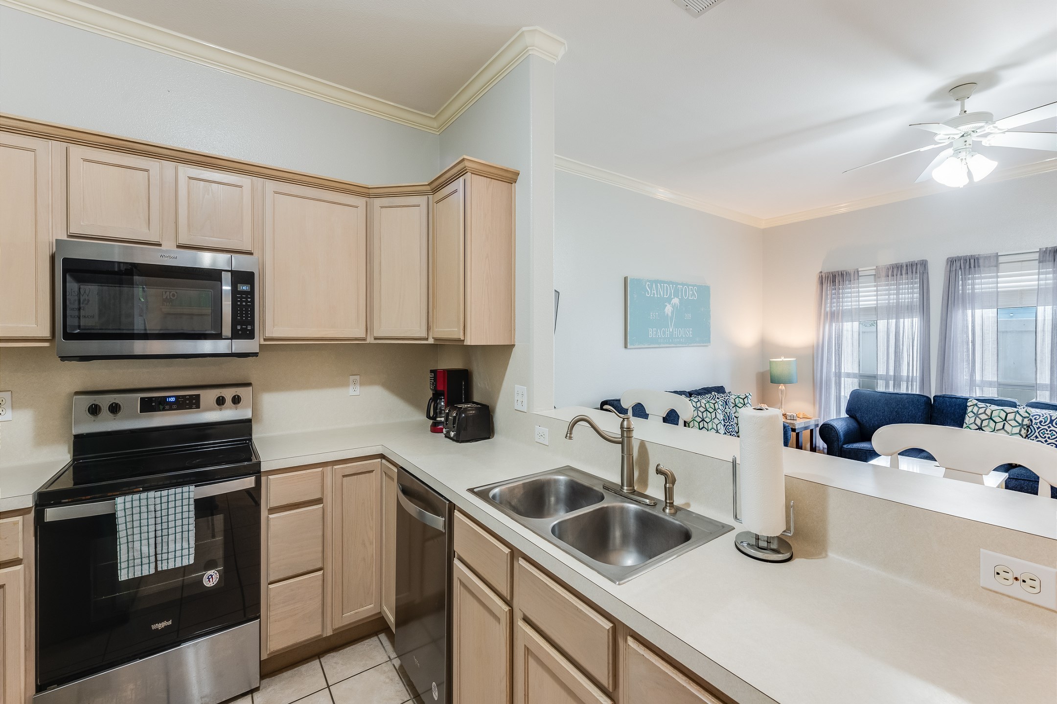 Fully equipped kitchen with stainless steel appliances and plenty of counter space