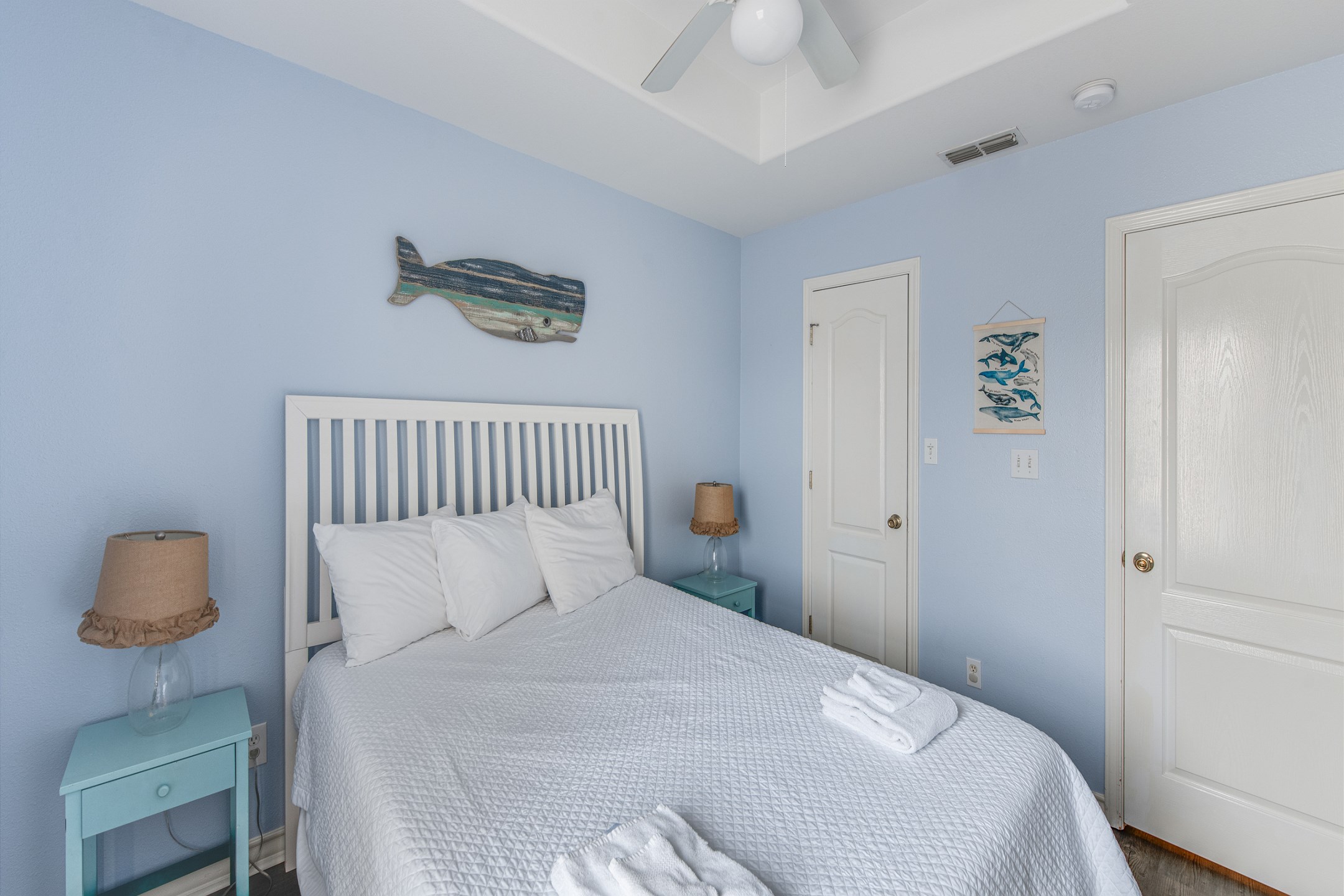Second bedroom on the second floor with queen size bed and flat screen TV
