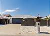 Front view of property with driveway parking