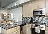 Fully equipped kitchen with updated appliances and plenty of storage