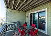 Private balcony off the living area with seating for four 