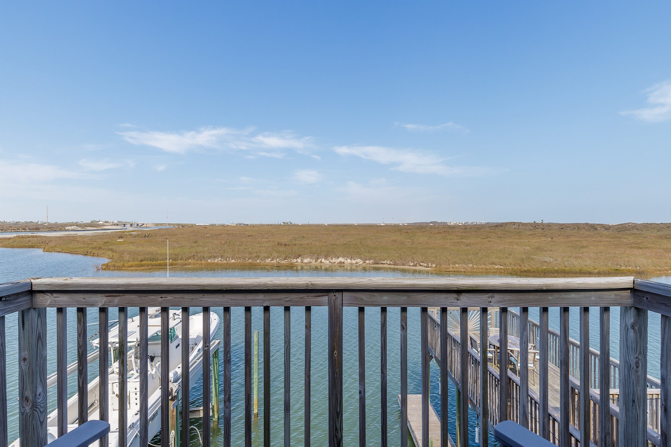 Private balcony off the second and third bedroom with an amazing view of the water 