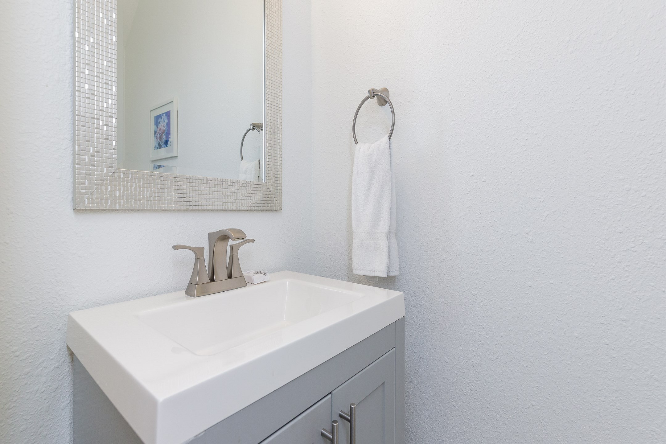 Convenient half bathroom located downstairs