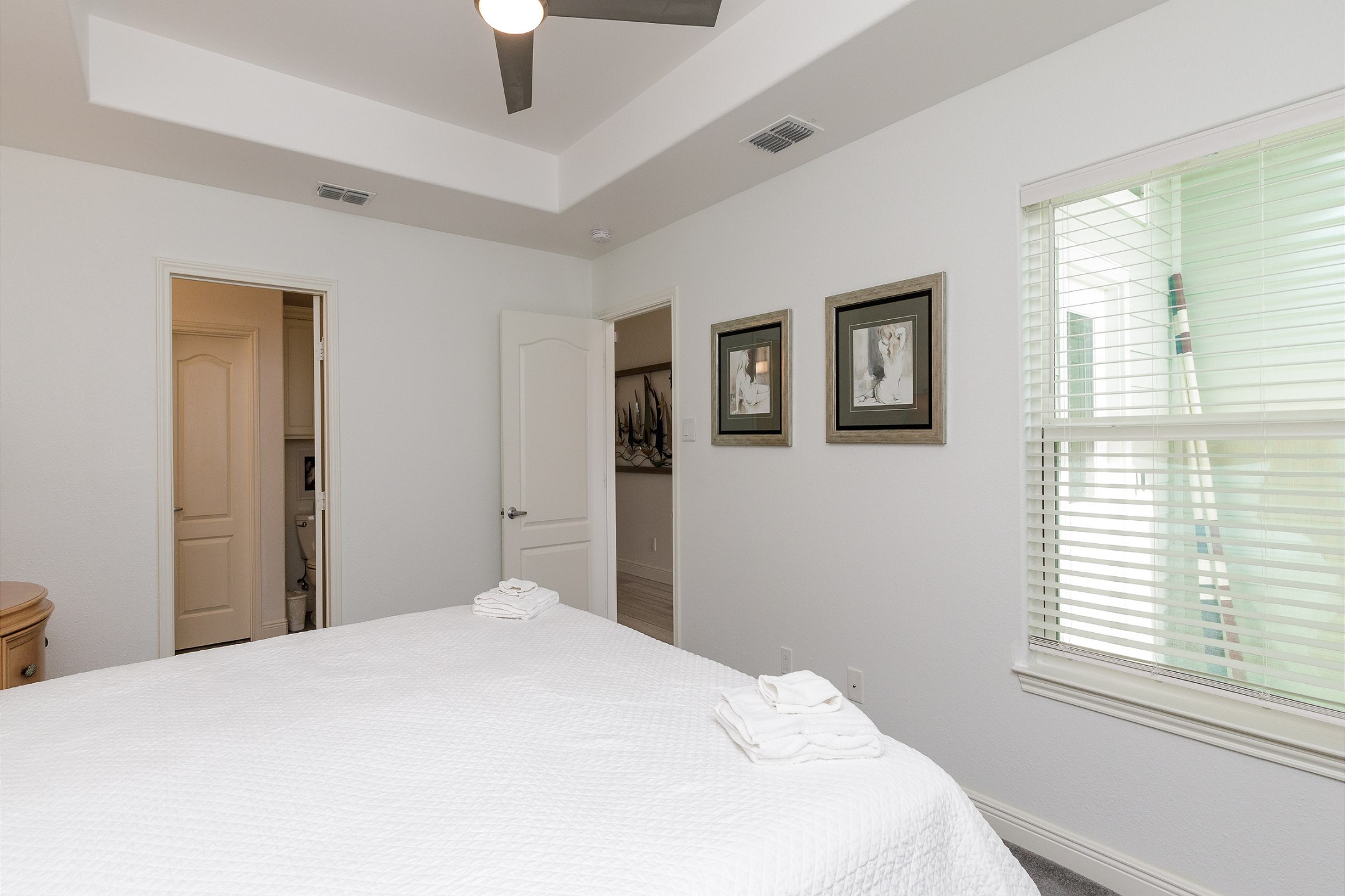 Master bedroom on the first floor with king size bed and private bathroom