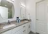 Master bathroom with double sinks and walk in shower 