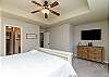 Master bedroom on the second floor with king size bed, private bathroom and flat screen TV