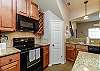 Fully equipped kitchen with updated appliances, plenty of storage and beautiful counter tops 