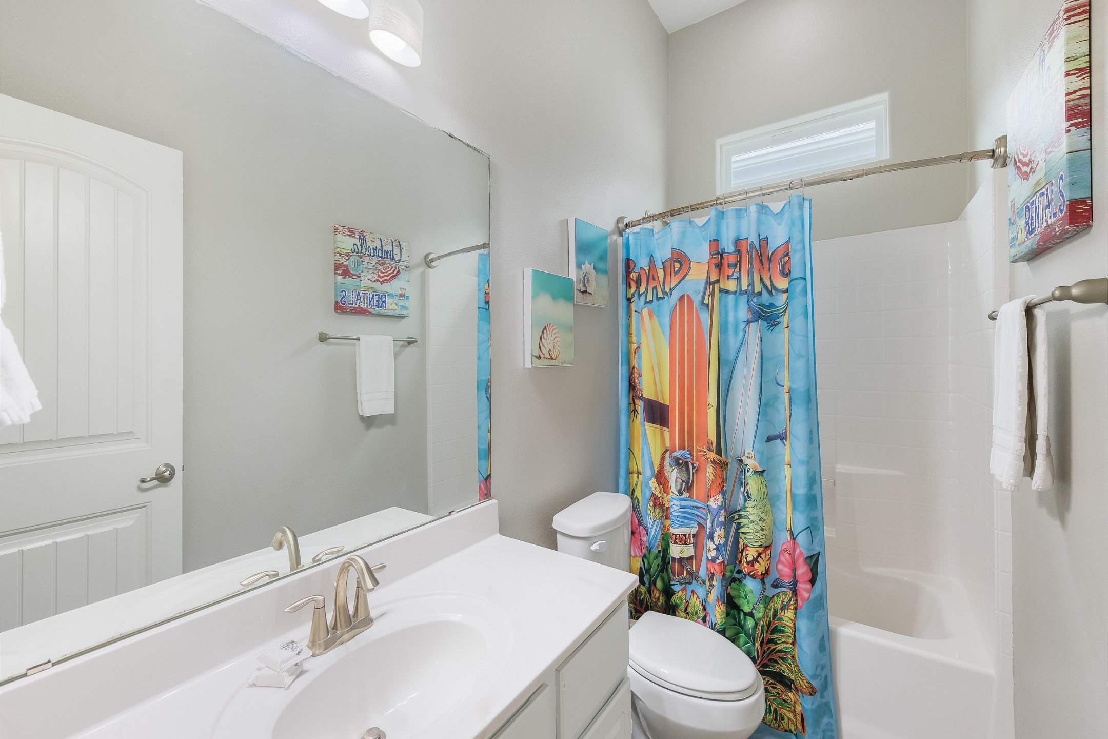 Guest bathroom with tub and shower