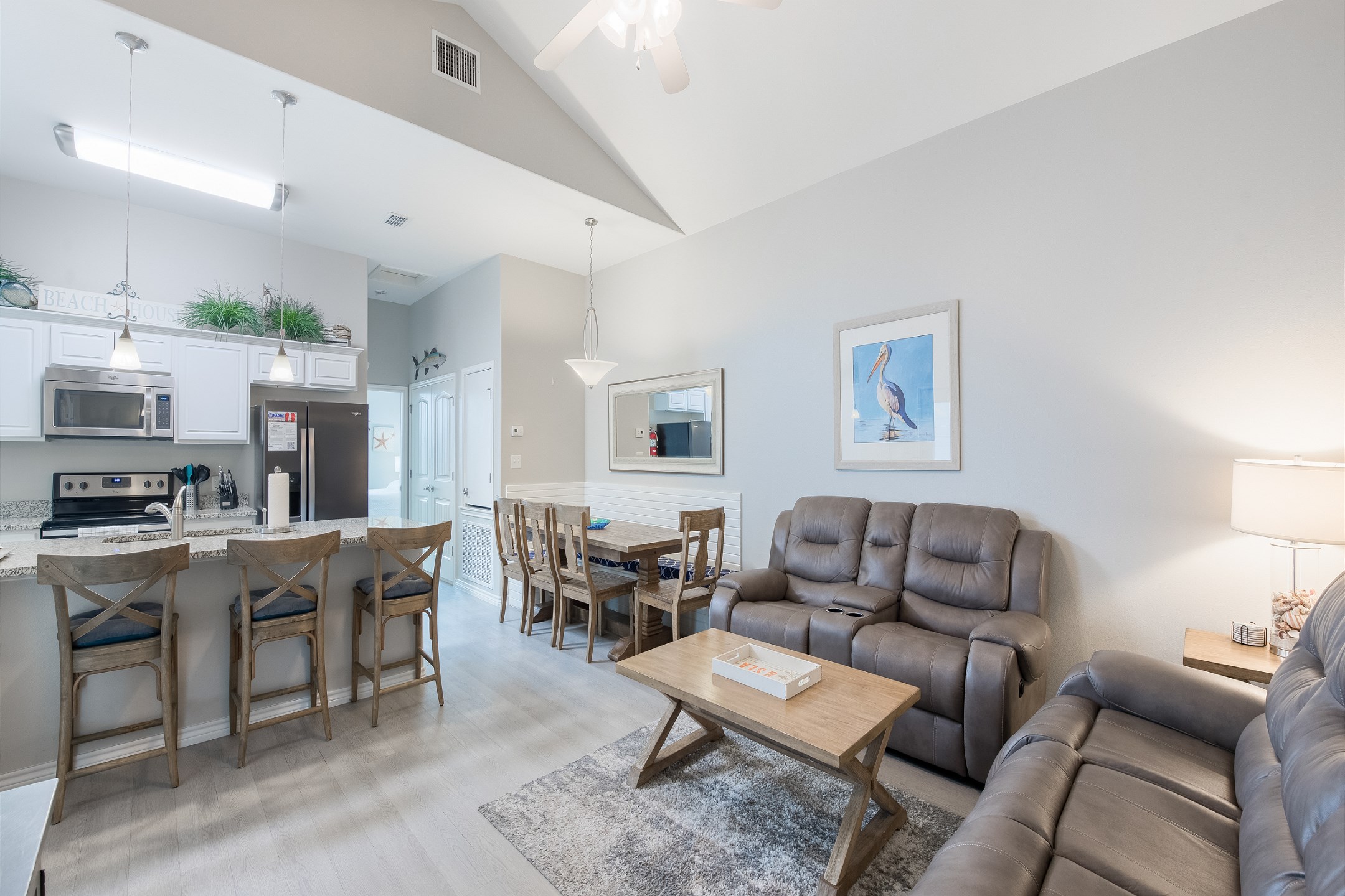 Cozy living area with flat screen TV to enjoy (seats do not recline)