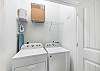 Convenient in-property washer and dryer available for guest use, ensuring a hassle-free stay