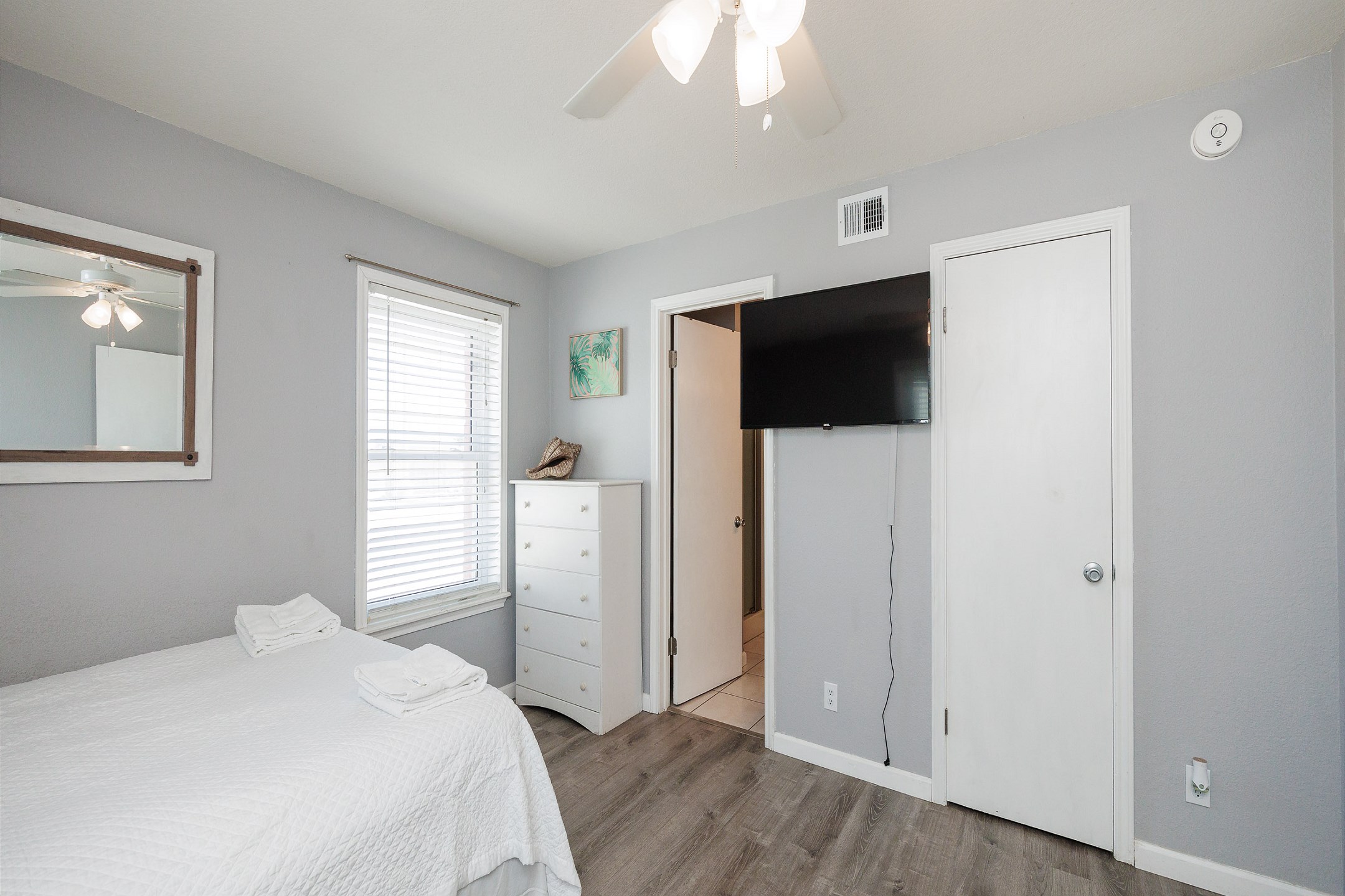 Master bedroom with queen and full size bed, private bathroom and flat screen TV 