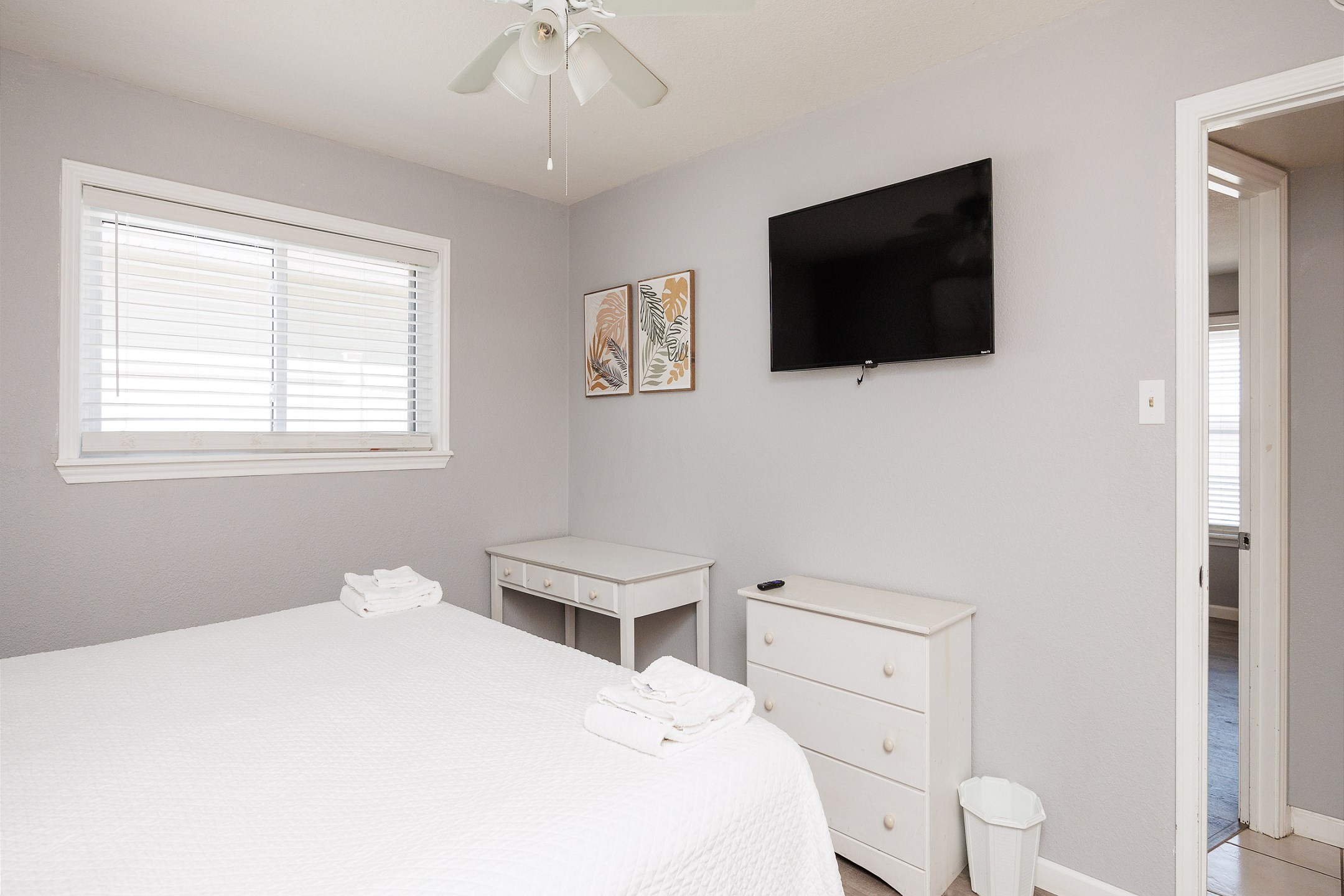 Second bedroom with a king size bed and flat screen TV for ultimate comfort