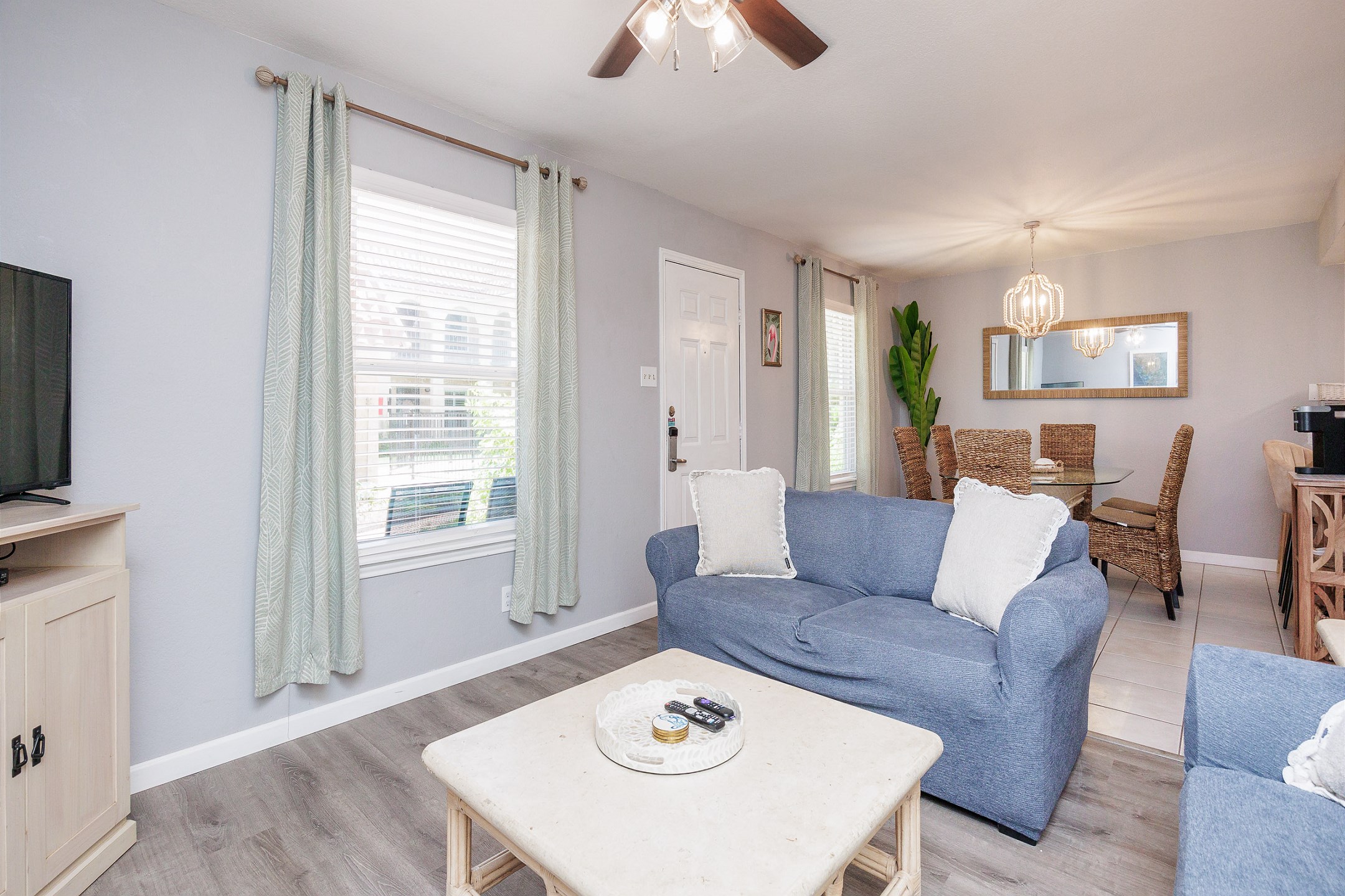 Cheerful living area featuring ample seating, perfect for family gatherings and relaxation