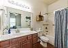 Master bathroom with tub and shower 