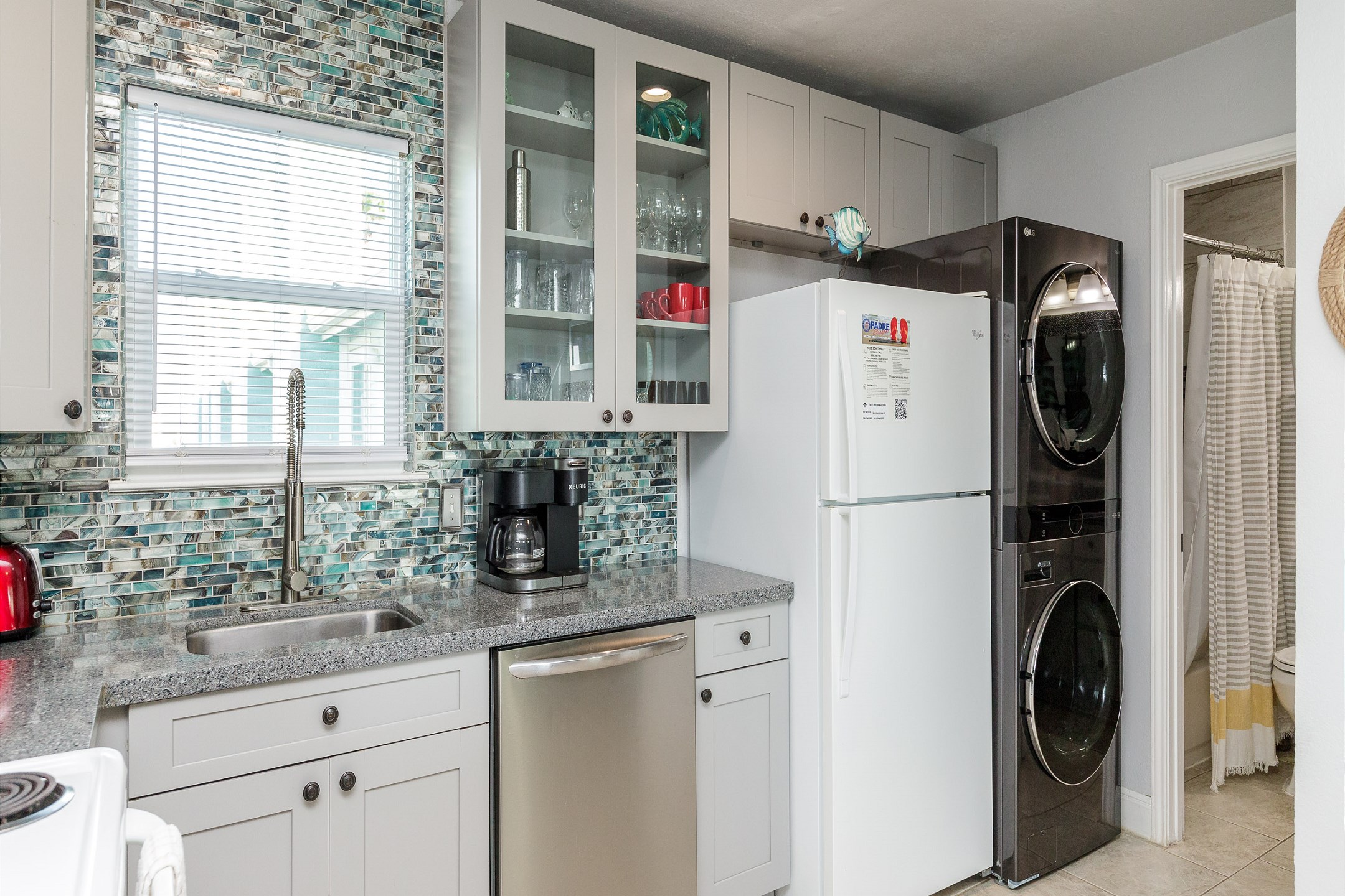 Great kitchen space with Keurig, 12-cup coffee maker and washer and dryer 