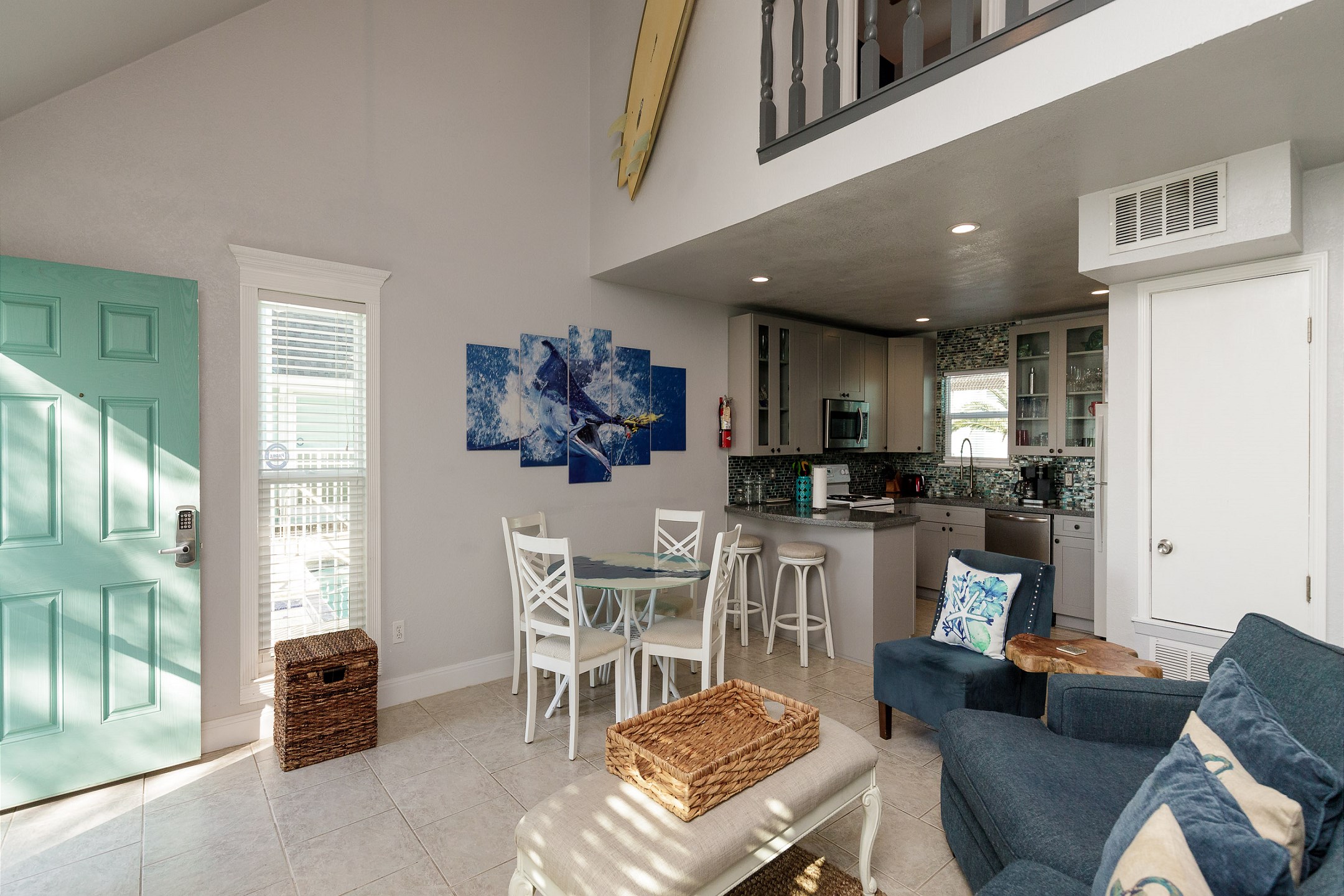 Open concept living, dining and kitchen to entertain family and friends while cooking or enjoying game night 