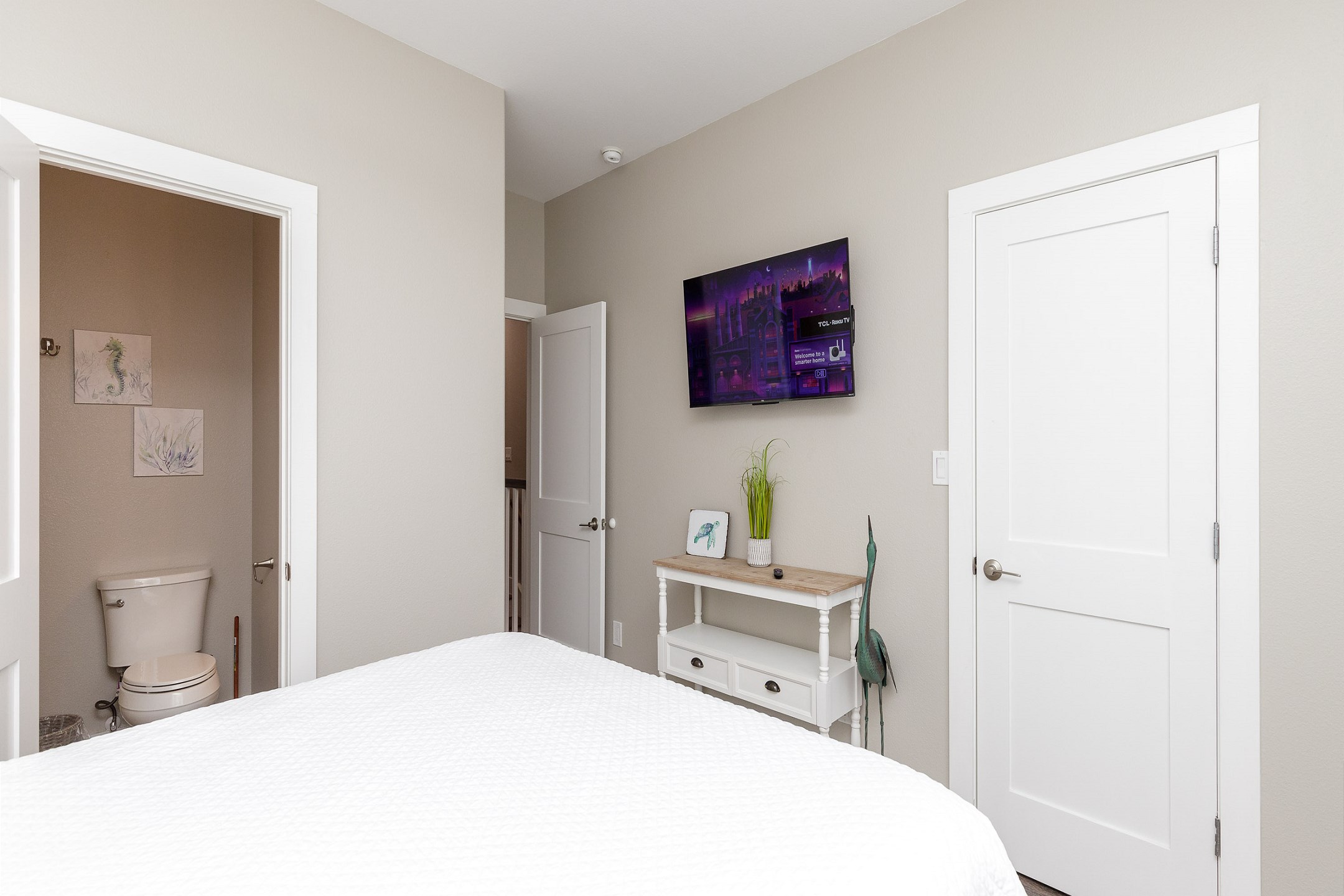 Second bedroom on the second floor with queen size bed and flat screen TV