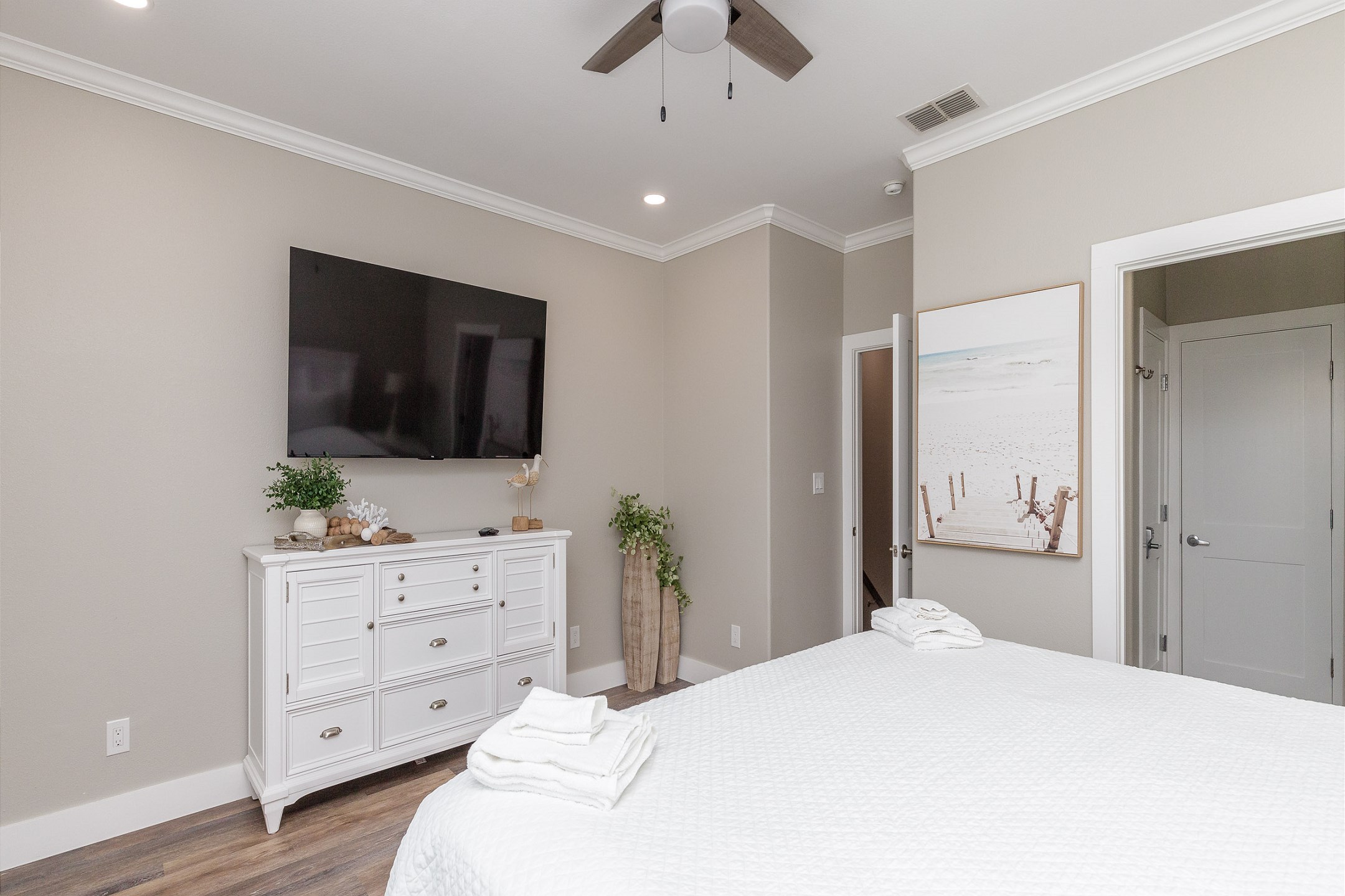 Master bedroom on the second floor with king size bed, private bathroom and flat screen TV
