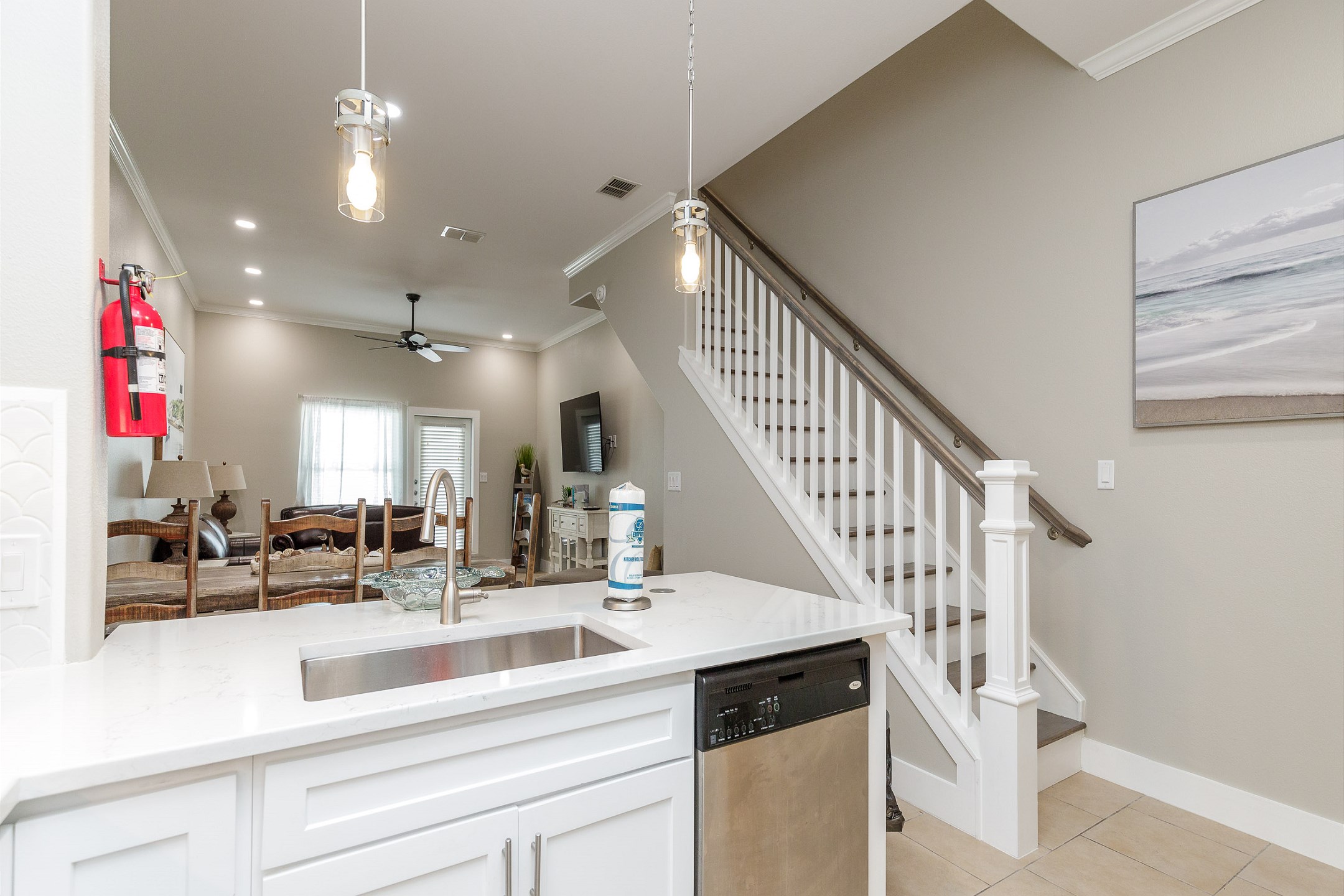 Kitchen area that over looks the living area and stairs leading to the bedrooms