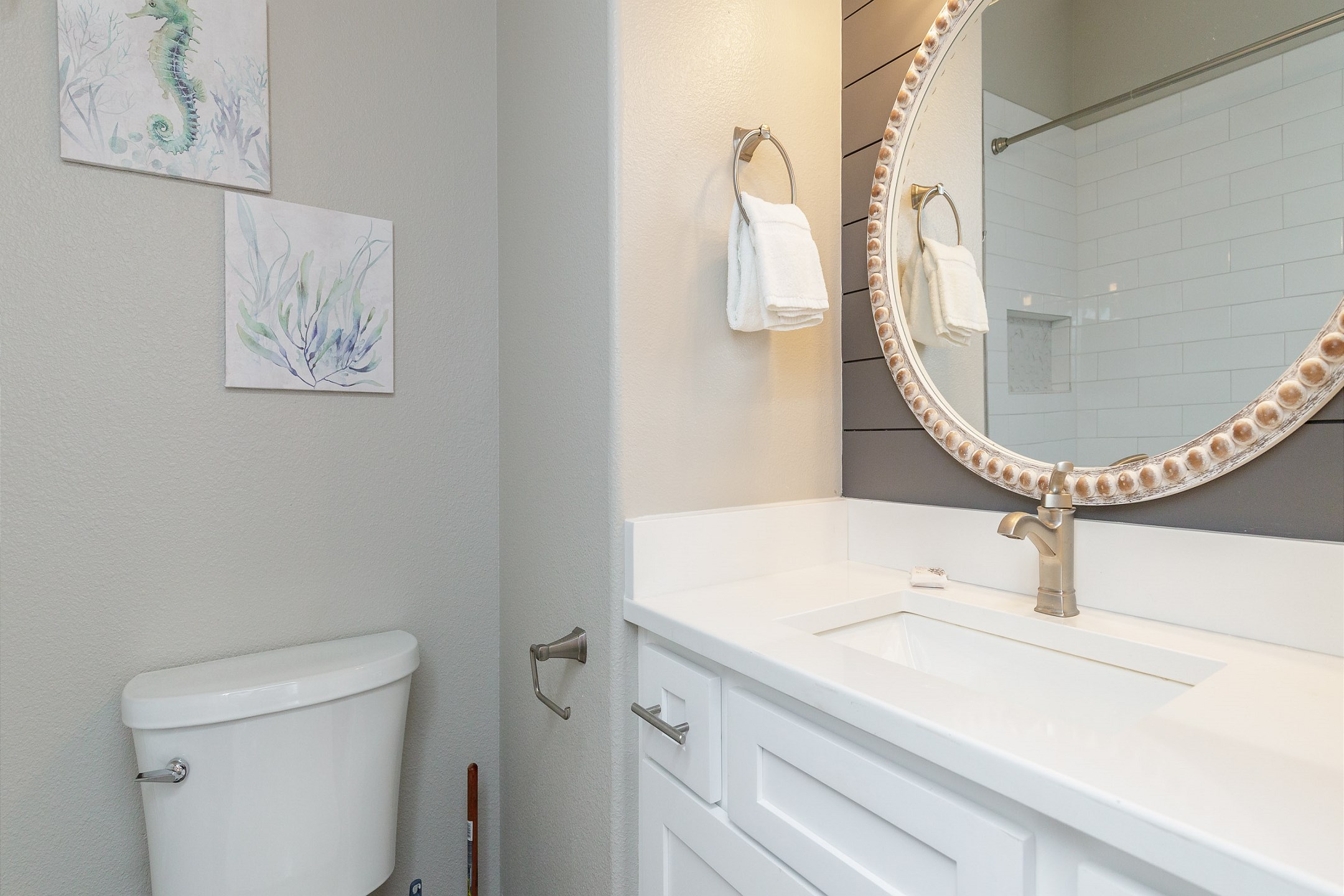 Guest bathroom on the second floor with tub and shower 