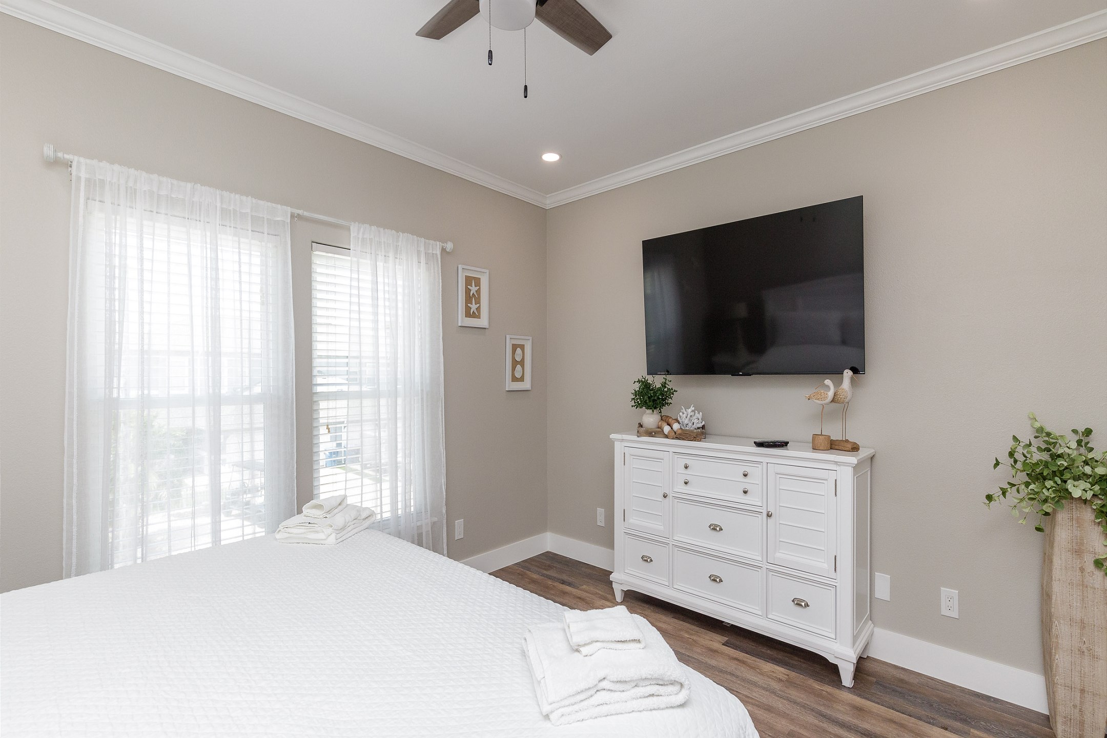 Master bedroom on the second floor with king size bed, private bathroom and flat screen TV