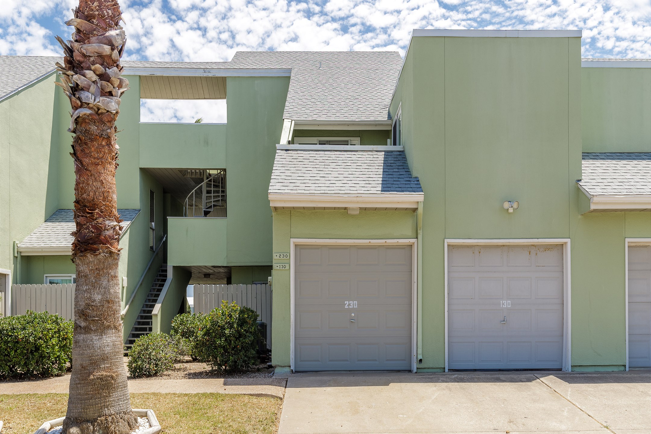 Reserved parking is available in front of the garage, though garage access is not included. The complex offers designated boat trailer parking, with a tag available for pickup at our office