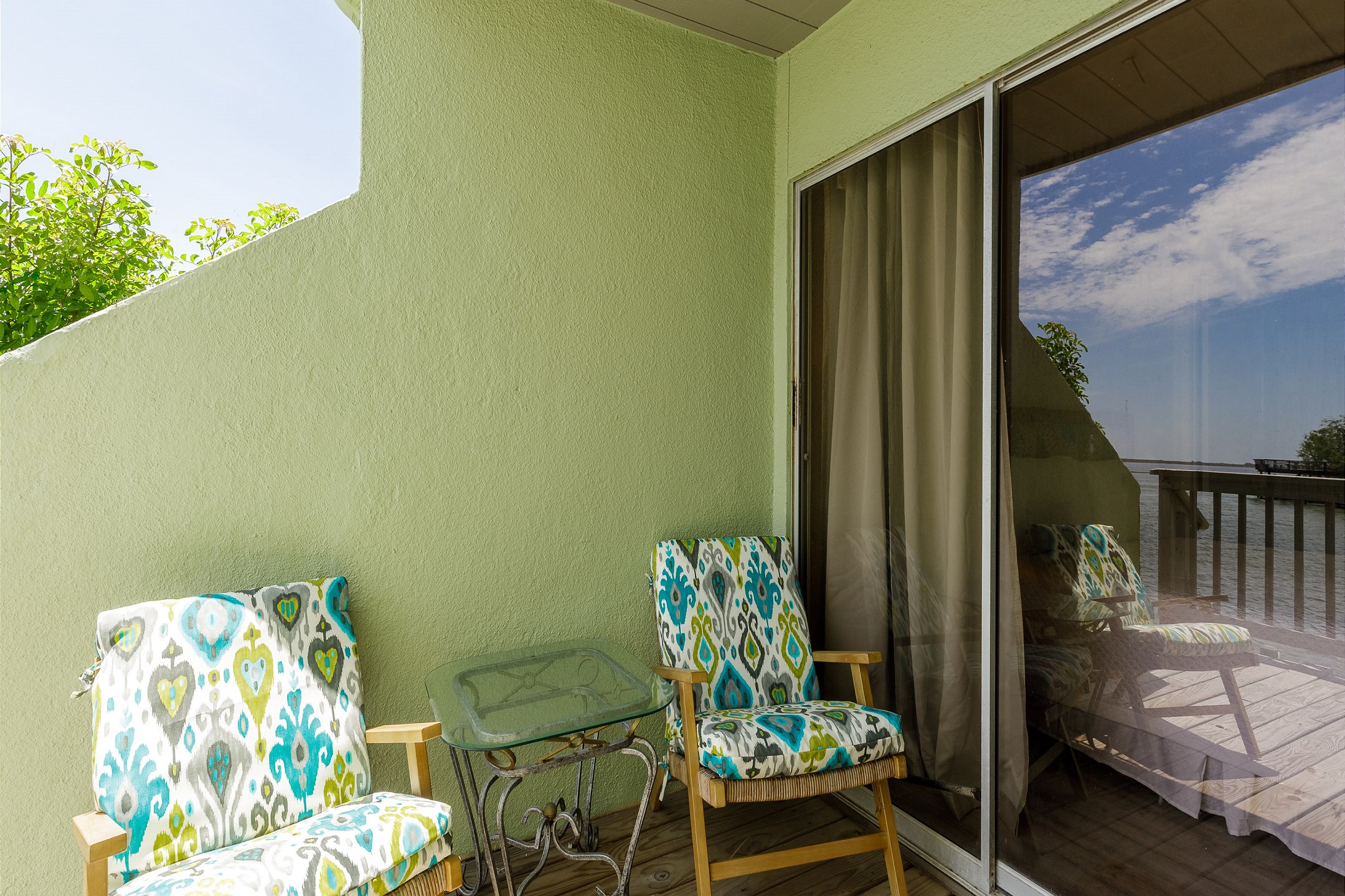 Private patio with access off the living area and master bedroom that over looks the beautiful canal waters