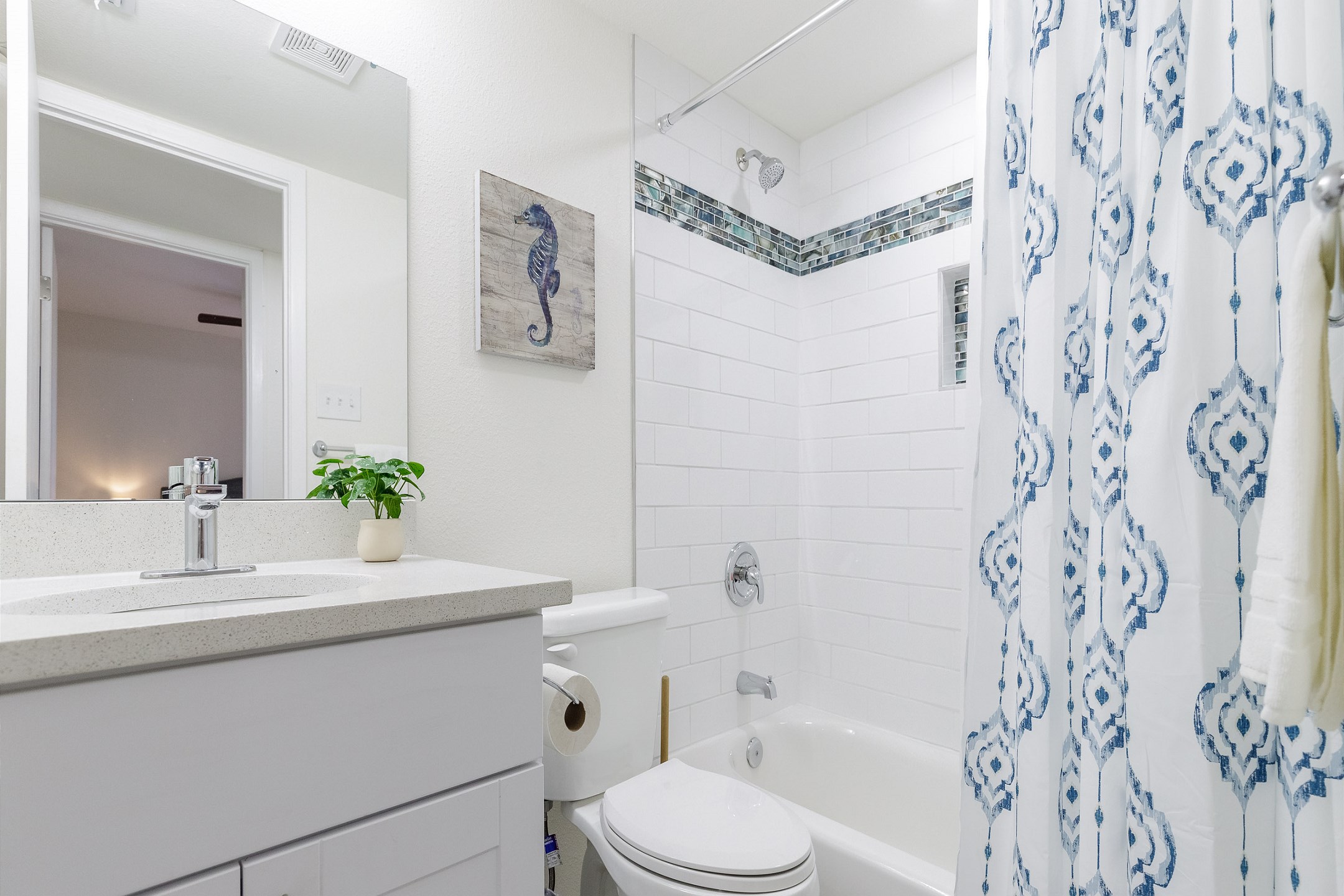 Chic guest bathroom with tub and shower