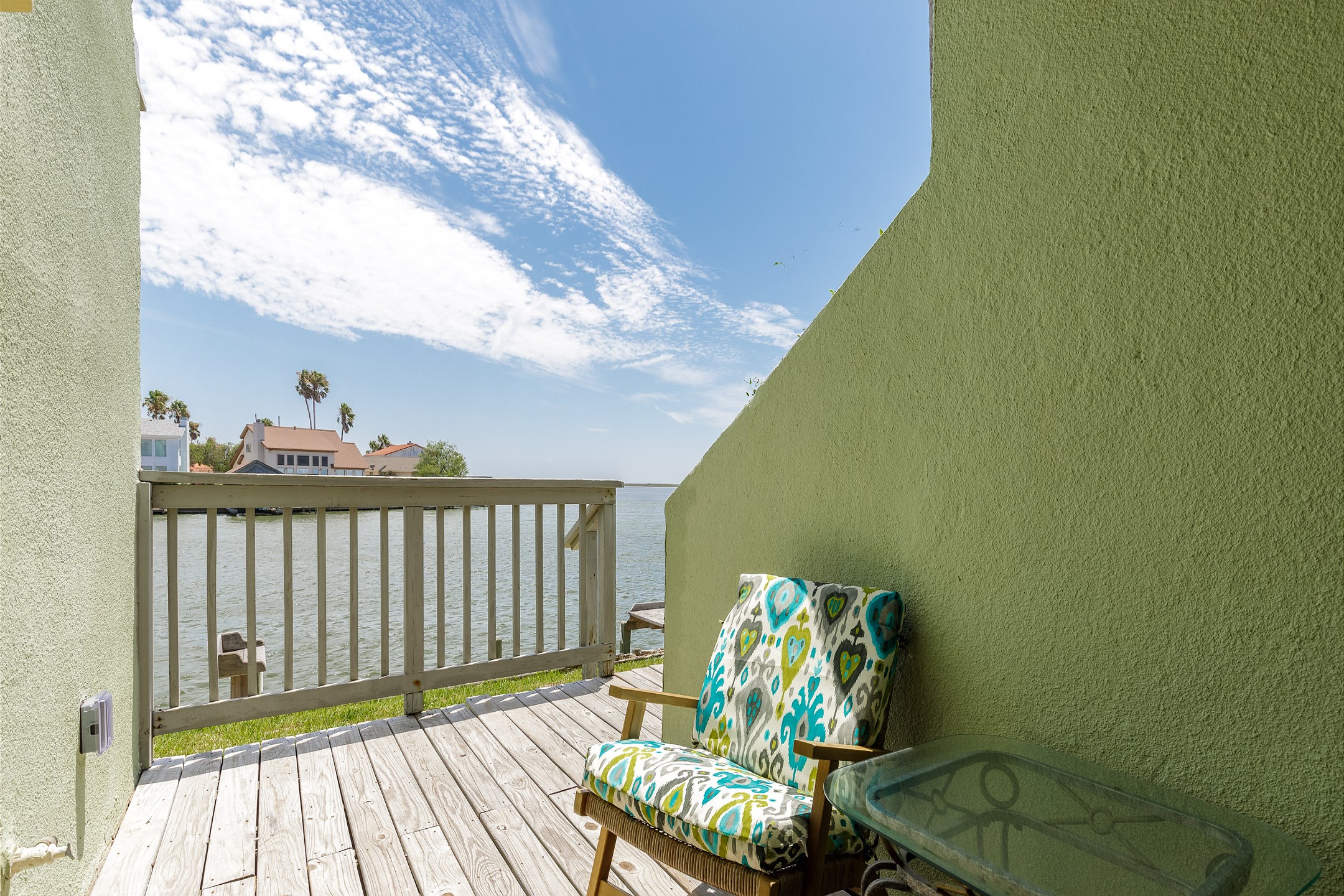 Private patio with access off the living area and master bedroom that over looks the beautiful canal waters