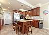 Fully equipped kitchen area with breakfast Island that seats four