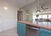 Kitchen area that opens up to the living space over looking the beach 