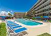 Ample seating to spend time with loved ones at the pool