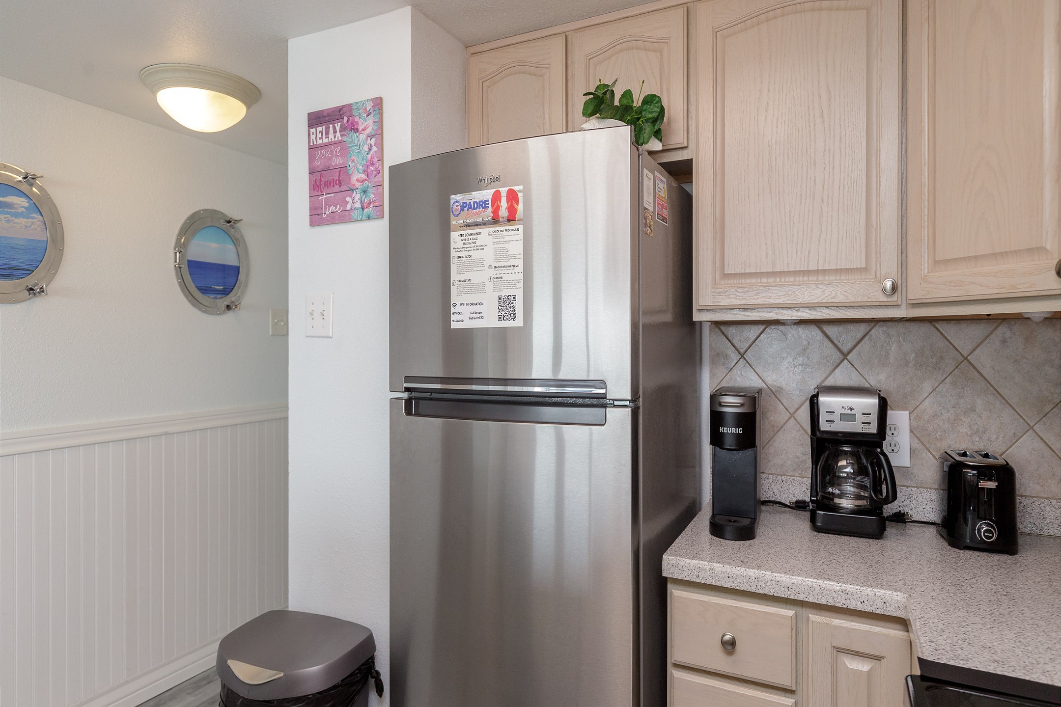 Kitchen area with Keurig and 12-cup coffee maker 
