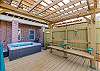 Enjoy the private hot tub with plenty of seating around 