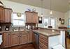 Fully equipped kitchen with plenty of storage space and beautiful counter tops 