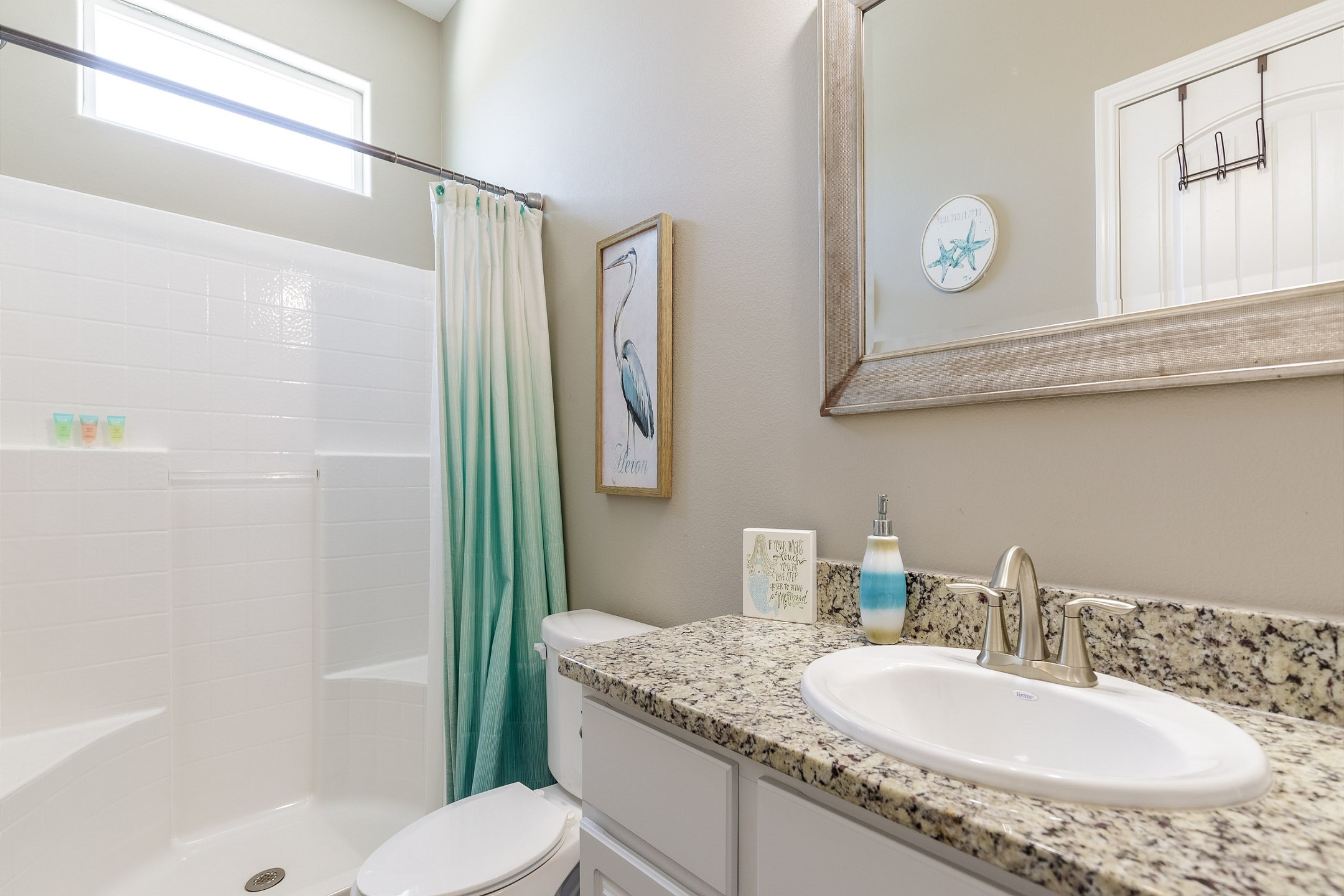 Master bathroom on the first floor with walk in shower