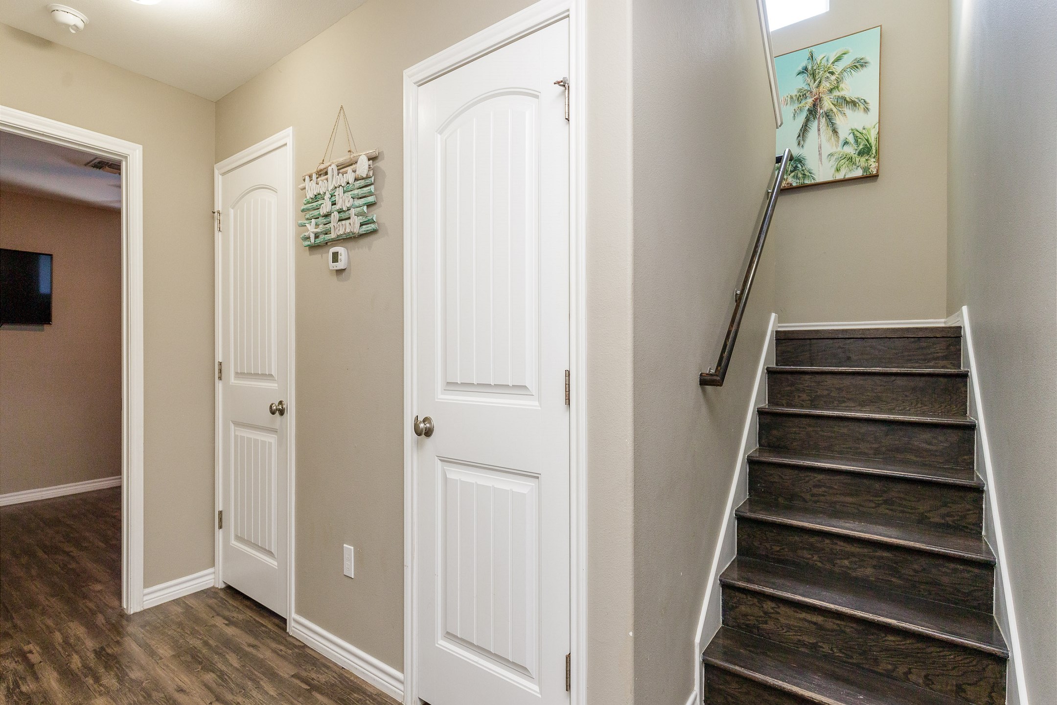 Leaving the first floor and heading to the second floor bedrooms and third level with living and kitchen space 