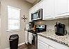 Fully equipped kitchen with stainless steel appliances and coffee maker (coffee not included)