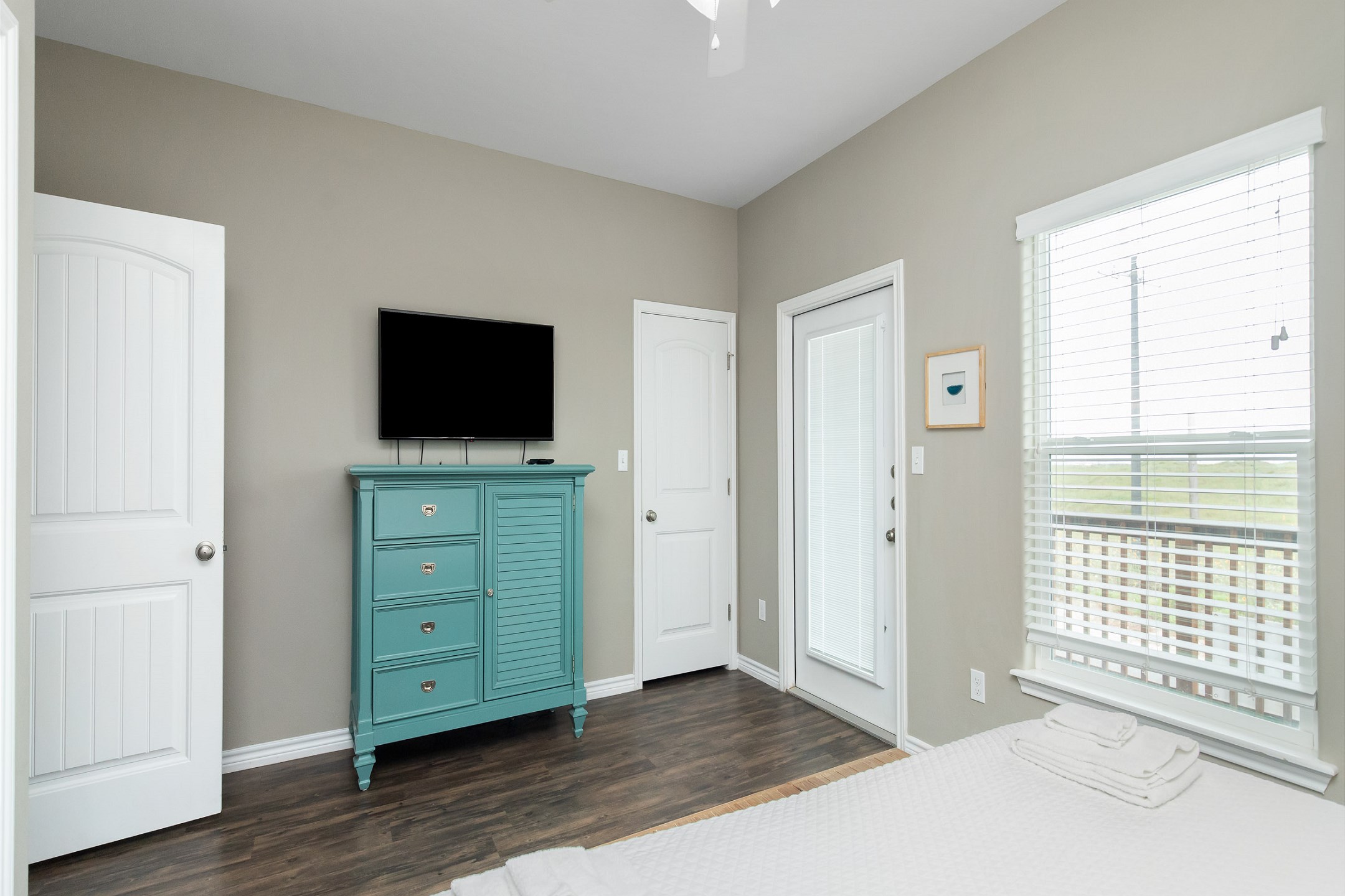 Second bedroom on the second floor with king size bed, private bathroom, private balcony and flat screen TV