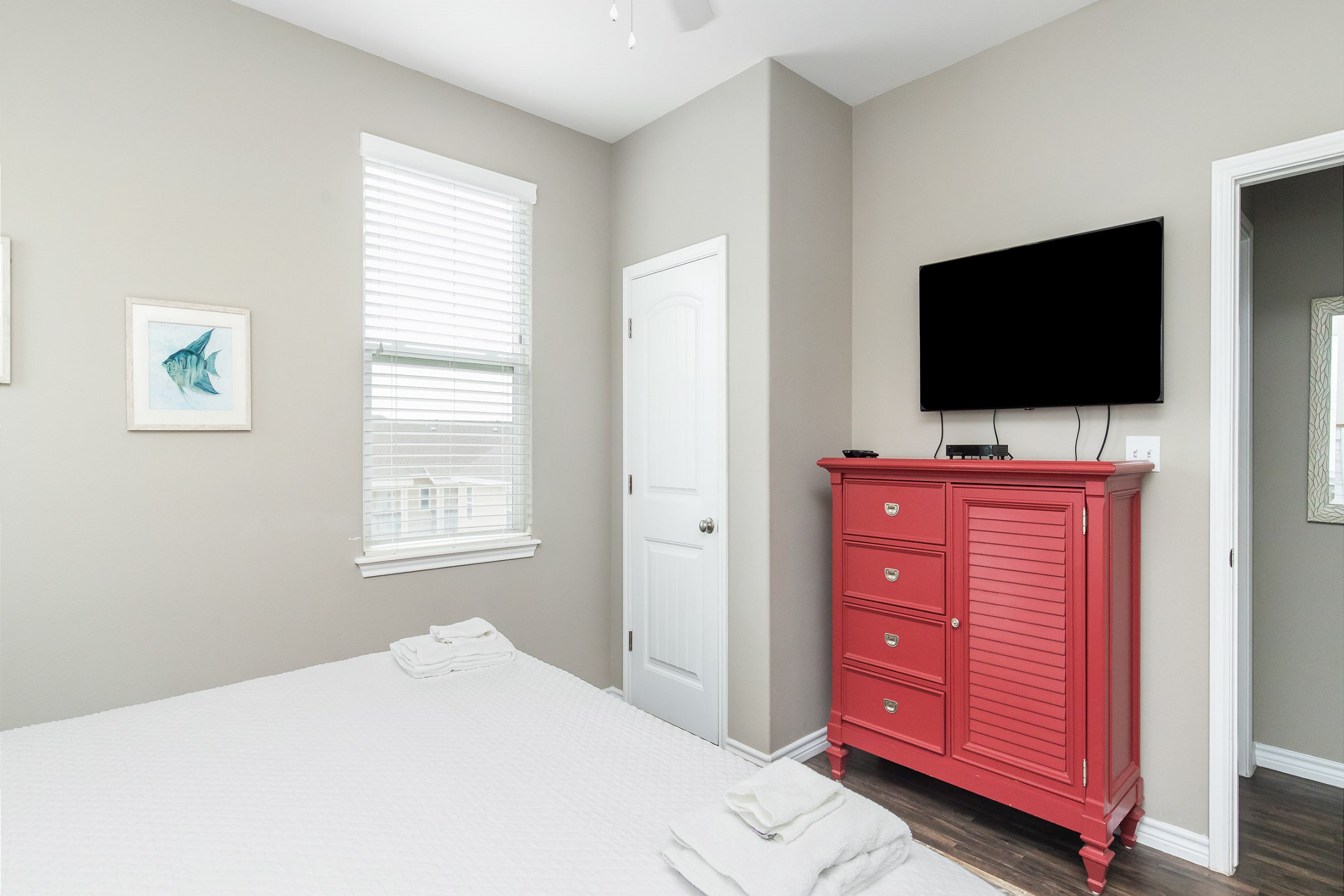 Fifth bedroom on the third floor with king size bed and flat screen TV