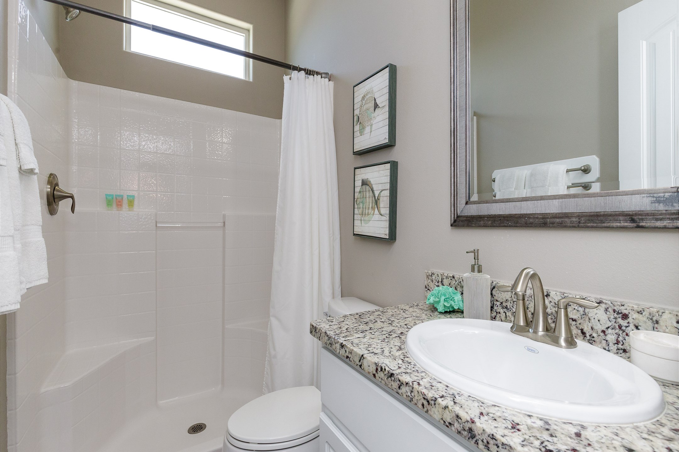 Guest bathroom on the third floor with walk in shower