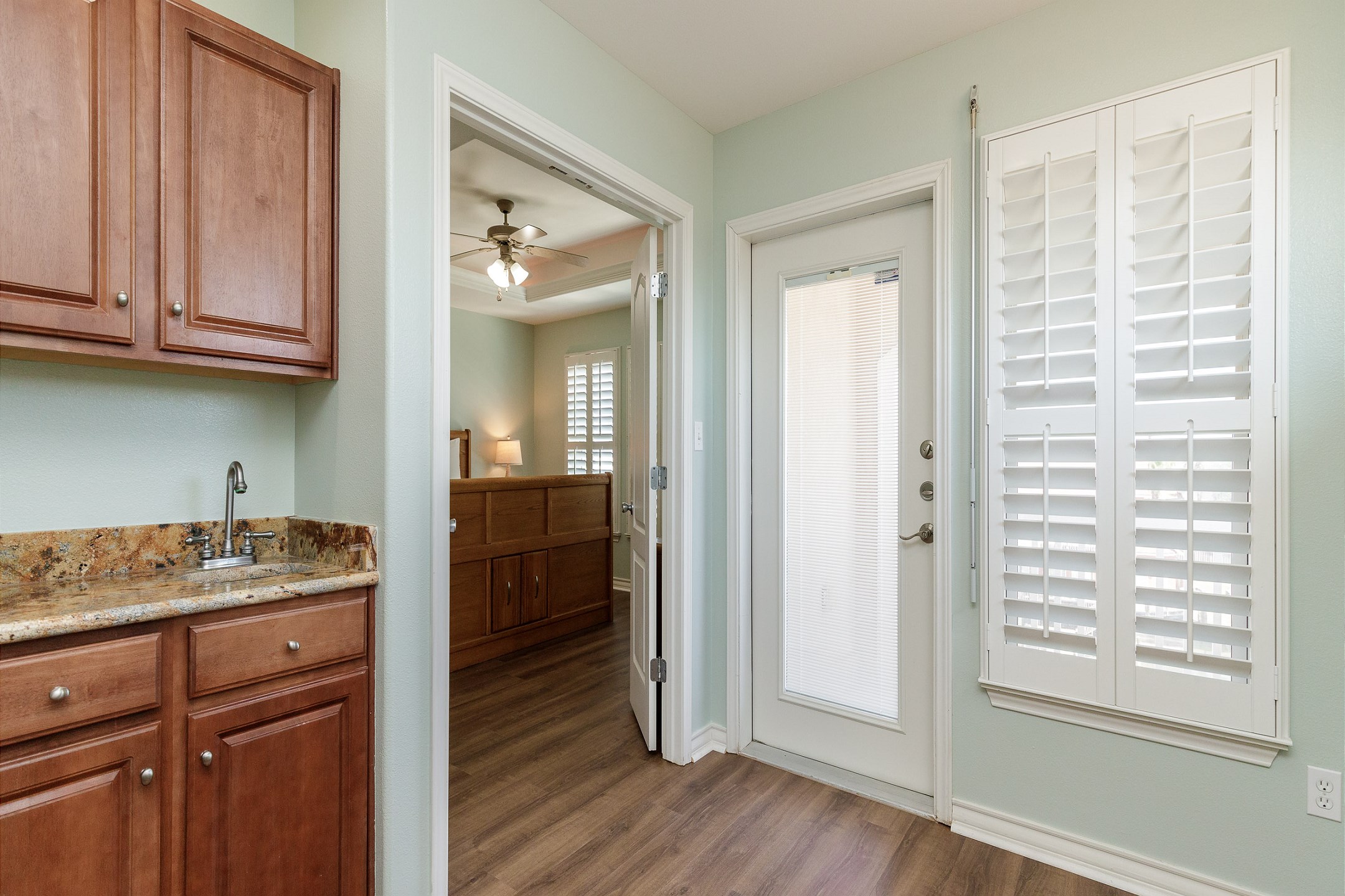 Third floor space with two bedrooms and access to the private balcony overlooking the water and small wet bar