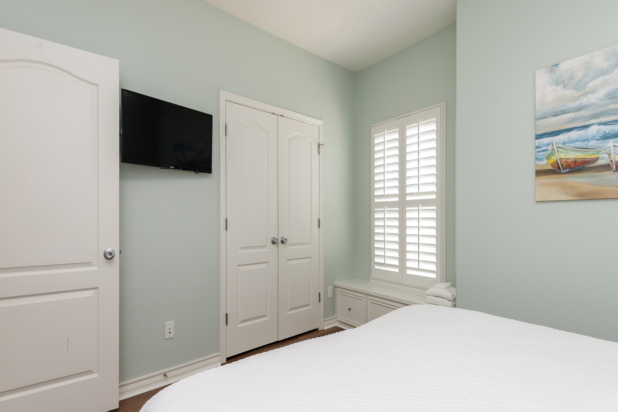 Third bedroom on the second floor with king size bed and flat screen TV