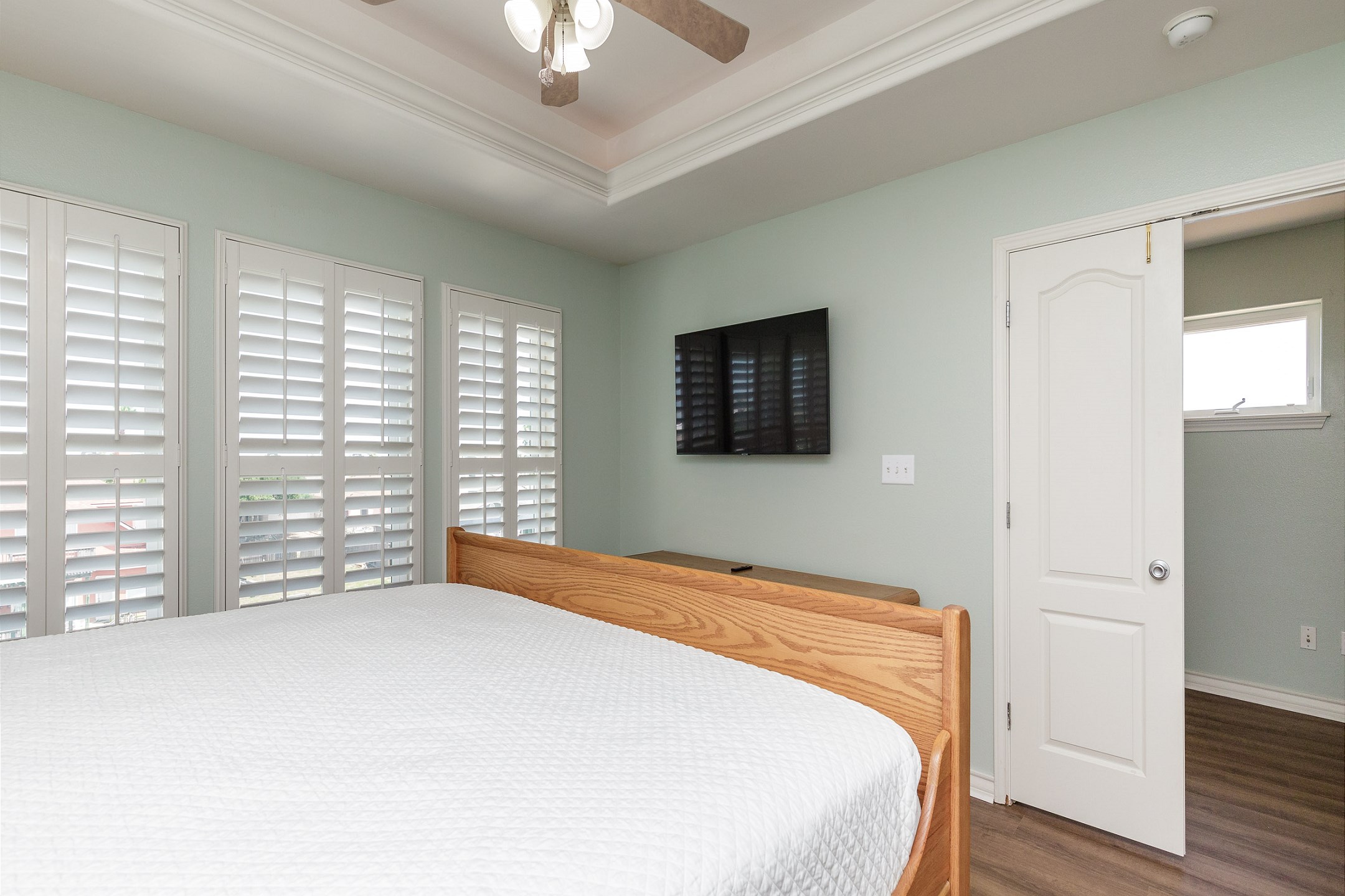 Master bedroom on the third floor with king size bed, private bathroom and flat screen TV