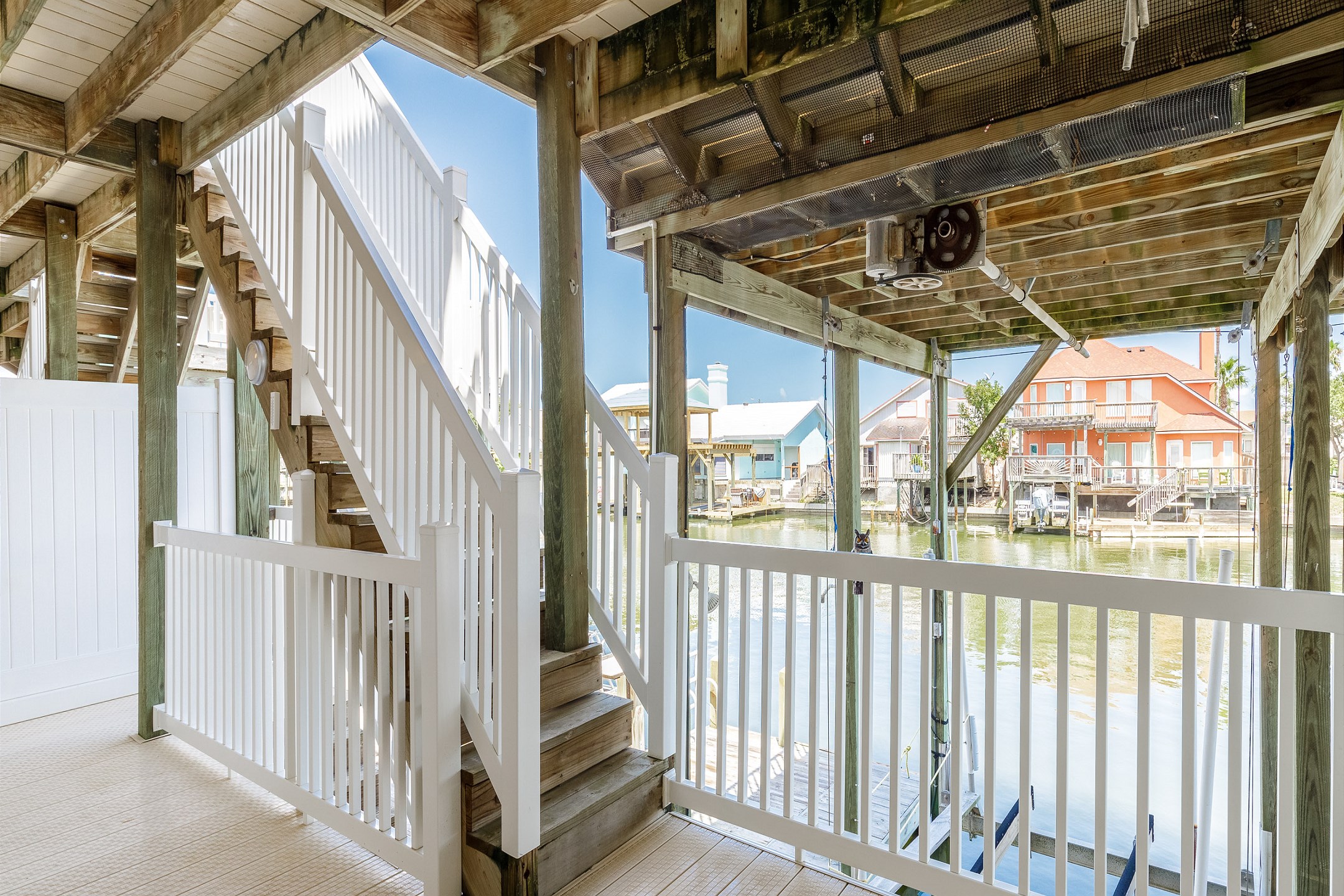 Access to the deck off the ground level bedroom with multiple levels and inviting spaces, this property offers endless ways to explore and unwind
